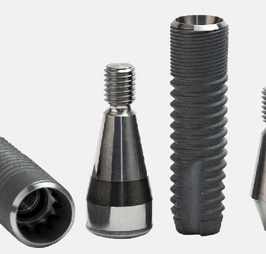 The effect of surgical insertion on dental implant surface topography